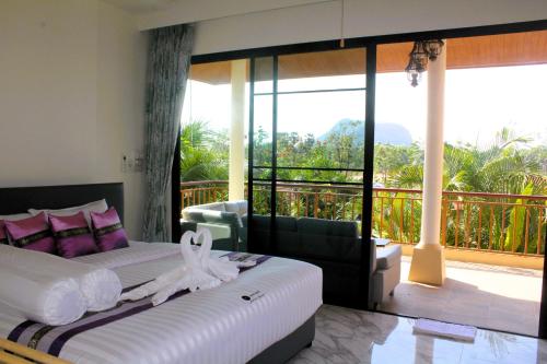 Katil atau katil-katil dalam bilik di Aurora Resort