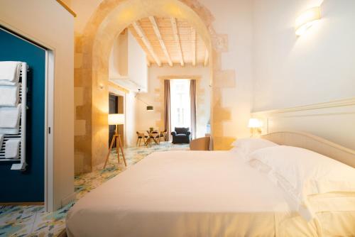 Letto o letti in una camera di Fortaleza Charme House