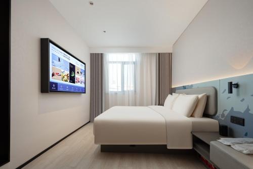 TV a/nebo společenská místnost v ubytování Atour Light Hotel Qingdao Zhanqiao Guancheng Road
