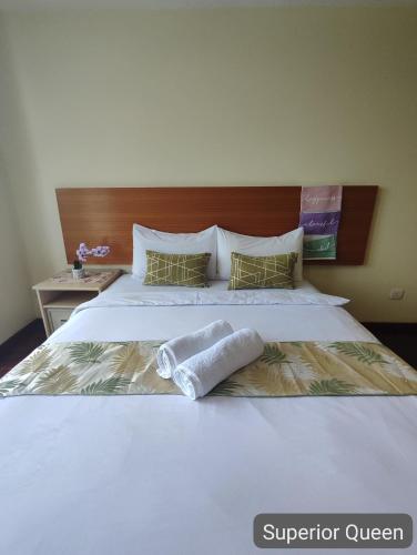 Кровать или кровати в номере SCC Hotel City Centre