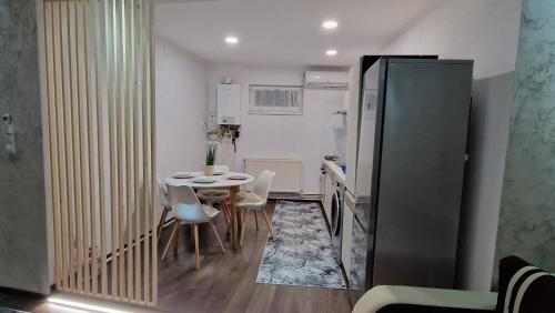 Kuchyň nebo kuchyňský kout v ubytování Dominic House