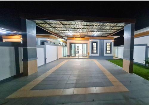 an empty hallway of a building at night at Chanita Resort Soidao in Chanthaburi