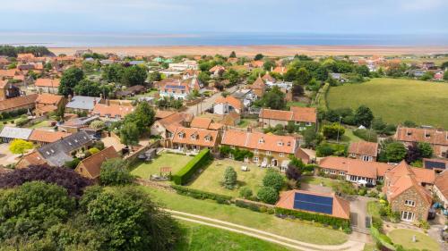 an aerial view of a small town with houses at Cliff Farmhouse B&B Suites in Hunstanton