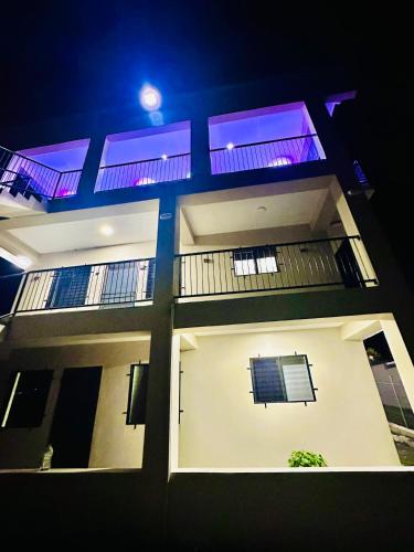 a view of a house at night at VNZ Luxury Apartment in Mba