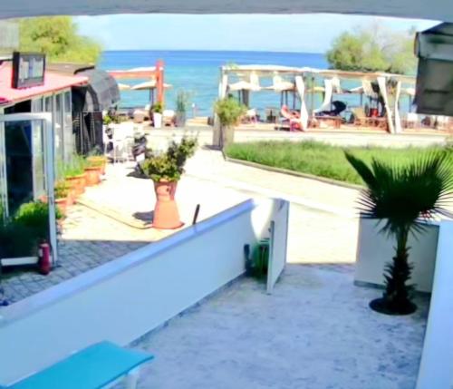 a view of the beach from the balcony of a house at SUN SEA No 7 first line in Perea