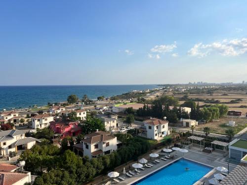 an aerial view of a resort with a swimming pool at Sea view in Boğaz