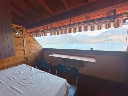 Photo de la galerie de l'établissement RESIDENCE BAY OF SILENCE - Lake View, Free Beach, Isle of Lake Iseo, à Monte Isola