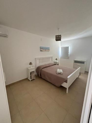 Letto o letti in una camera di Le Casette del Porto di Sciacca