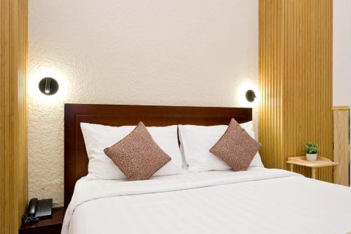 Katil atau katil-katil dalam bilik di Khanh Lai Hotel 慶來旅店