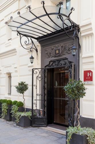 an entrance to a building with a black door at Appia La Fayette in Paris
