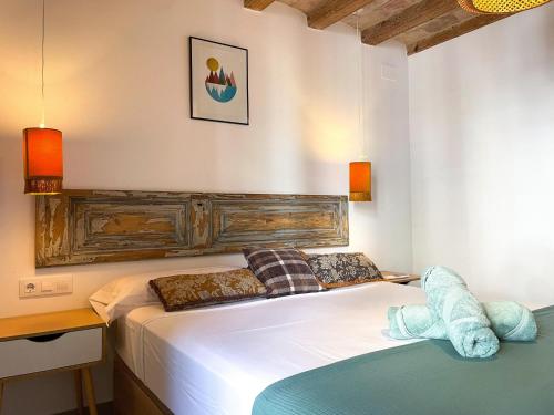 two beds sitting next to each other in a bedroom at Apartment Rafol in Vilanova i la Geltrú