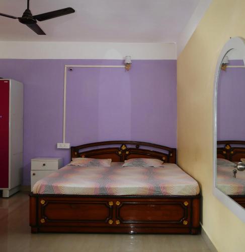 Postel nebo postele na pokoji v ubytování Dreams Abode 01 STUDIO APARTMENT