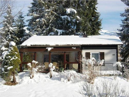 Ferienhäuser im Feriendorf Weissensee im Allgäu E v zimě