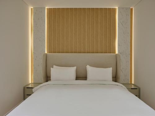 Voodi või voodid majutusasutuse Nur Aparthotel Athens toas