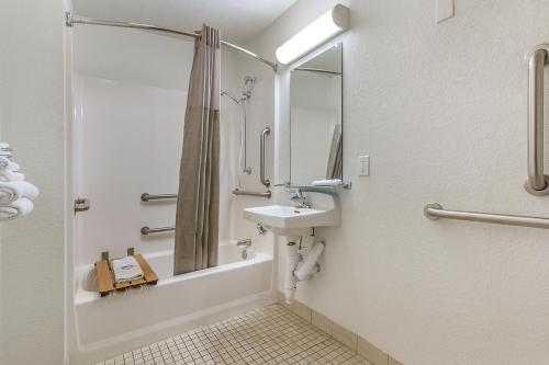 a bathroom with a sink and a shower at Motel 6-Phoenix, AZ - North Bell Road in Phoenix