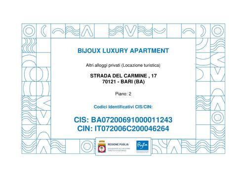 a ticket for an event with a black and white pattern at Bijoux Luxury Apartment in Old Town in Bari