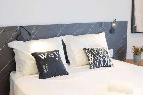 Postel nebo postele na pokoji v ubytování Way Tambaú - Studios Deluxe em João Pessoa por Carpediem