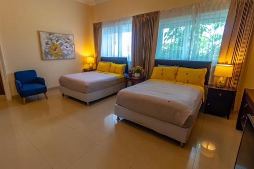 Postel nebo postele na pokoji v ubytování Villa Segovia Cozumel
