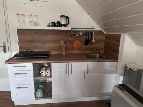 Η κουζίνα ή μικρή κουζίνα στο Gemütliche Ferienwohnung in Rödermark