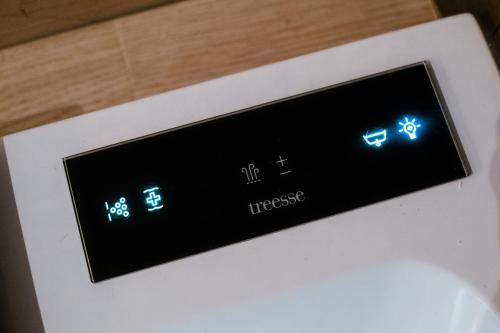 an alarm clock with blue clocks on it at 18zero2 luxury rooms in Bari