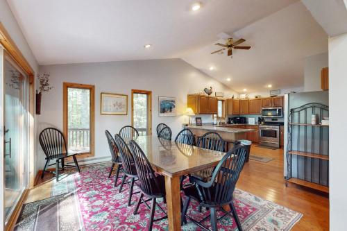a dining room with a table and chairs at Mirabella Eclano in McHenry