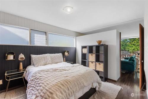 a bedroom with a large bed and a window at 1BR 1BA Emerald Garden Bliss Seattle Location in Seattle