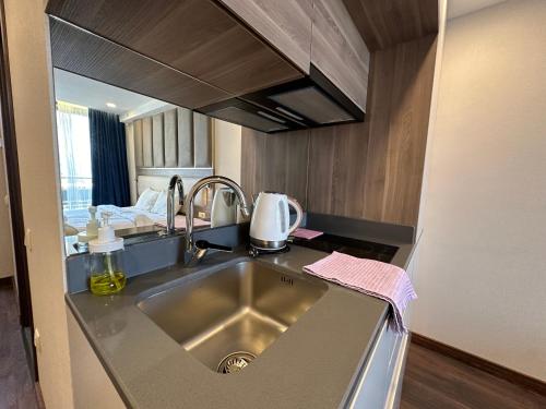 Kuchyň nebo kuchyňský kout v ubytování Seaside sunny apartments 95c