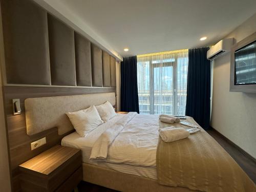 Postel nebo postele na pokoji v ubytování Seaside sunny apartments 95c