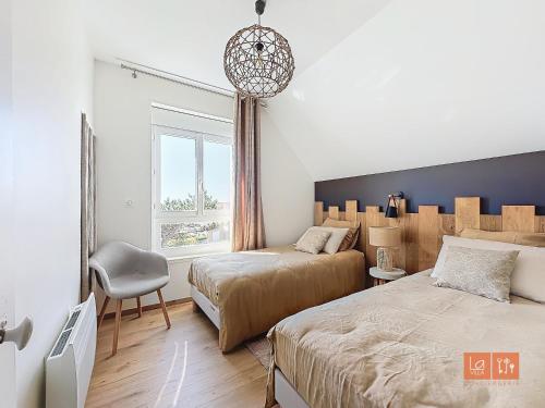 Ένα ή περισσότερα κρεβάτια σε δωμάτιο στο Villa Ma Mie