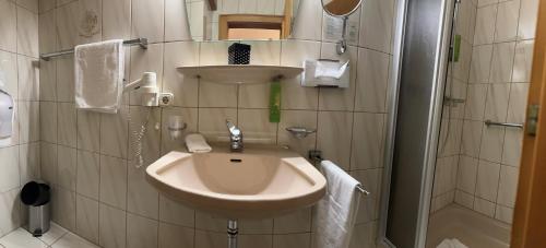 Koupelna v ubytování Seehotel Brunner