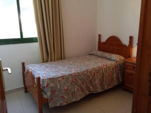 Ένα ή περισσότερα κρεβάτια σε δωμάτιο στο Apartamento Bajo en el Tamaduste Zona Privilegiada