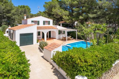 an aerial view of a house with a swimming pool at Villa Linda by 3VILLAS in Son Parc