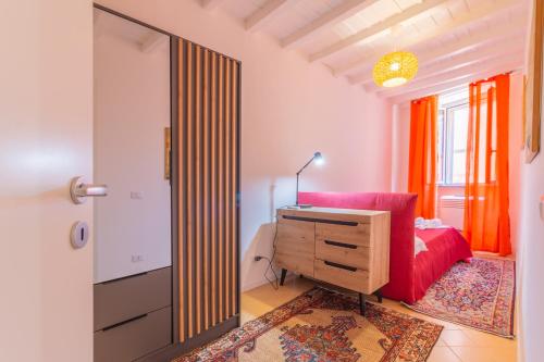 Postel nebo postele na pokoji v ubytování Pettinara Suites