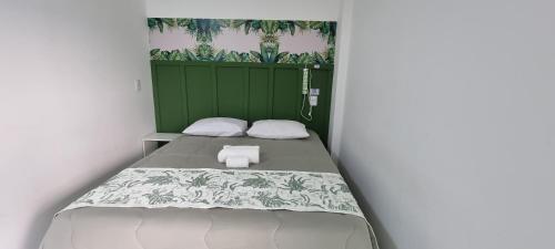 Postel nebo postele na pokoji v ubytování Iguassu Jungle pousada