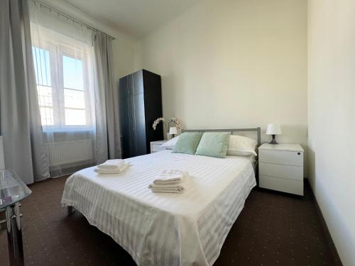 Postel nebo postele na pokoji v ubytování Hotel Mazowiecki WOW