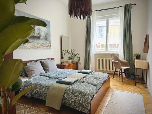 Posteľ alebo postele v izbe v ubytovaní Boho Apartment in Old Town