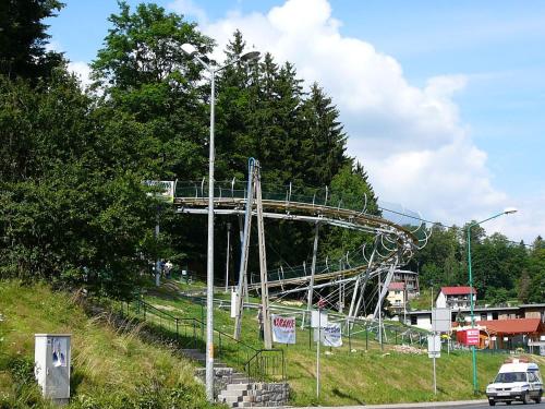 a roller coaster on the side of a hill at Józefina Apartament's blisko centrum in Szklarska Poręba