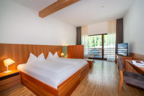 Postel nebo postele na pokoji v ubytování Bed & Breakfast Hotel Nives