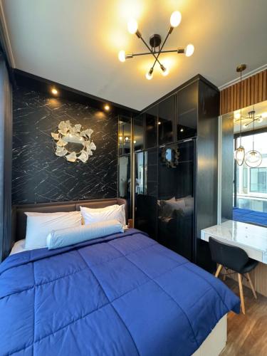 Ένα ή περισσότερα κρεβάτια σε δωμάτιο στο CJ House PIK 2