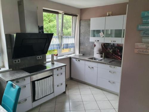 Η κουζίνα ή μικρή κουζίνα στο Schöne Ferienwohnung