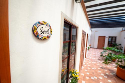 a sign that says brunch on the side of a building at La Casa de Los Abuelos Hotel Boutique in Ixtlán del Río