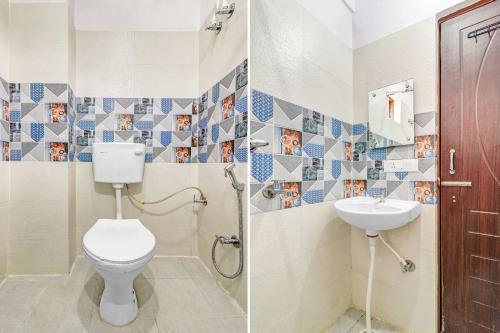 a bathroom with a toilet and a sink at Super Collection O The Kailash Hotel in Dehradun
