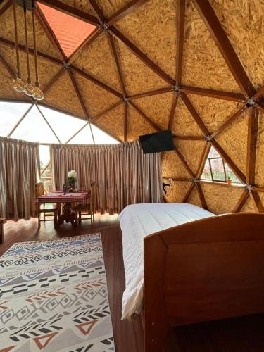 Katil atau katil-katil dalam bilik di Antawara Glamping