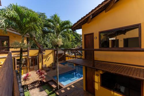 a view of the balcony of a house with a swimming pool at Nova Pousada Don Pepe in Barra Grande