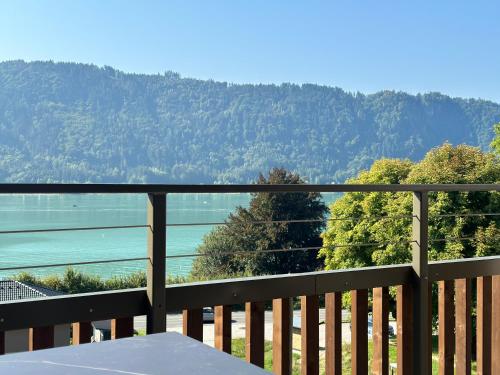 a balcony with a view of the water at Apartment Deluxe Ossiacher See - Gerlitzen in Sattendorf