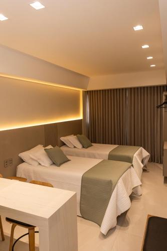 Ένα ή περισσότερα κρεβάτια σε δωμάτιο στο Riva Apart Hotel