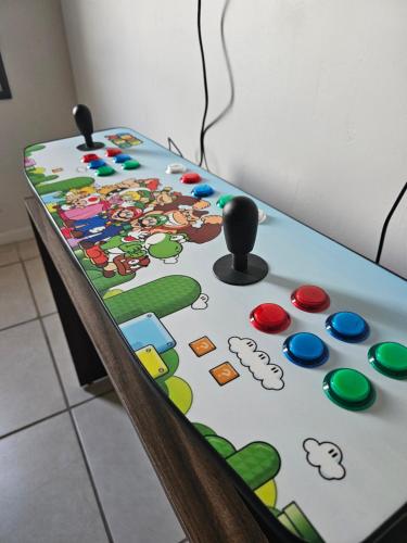 a table with cartoon characters on it at Departamento Frontera #4 en el Campestre in Ciudad Juárez