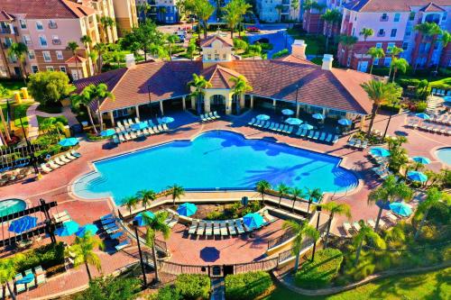 an overhead view of a large swimming pool at a resort at Seaescape in Orlando
