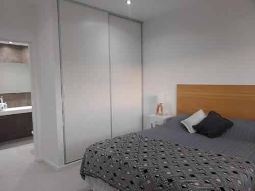 Ένα ή περισσότερα κρεβάτια σε δωμάτιο στο Casa en Costa Esmeralda, Golf 2