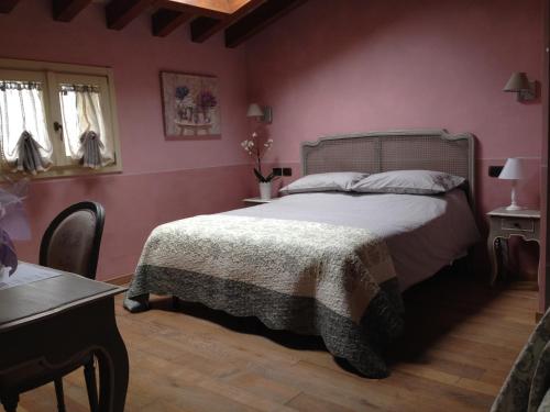 Ένα ή περισσότερα κρεβάτια σε δωμάτιο στο La Vedetta Bed and Breakfast